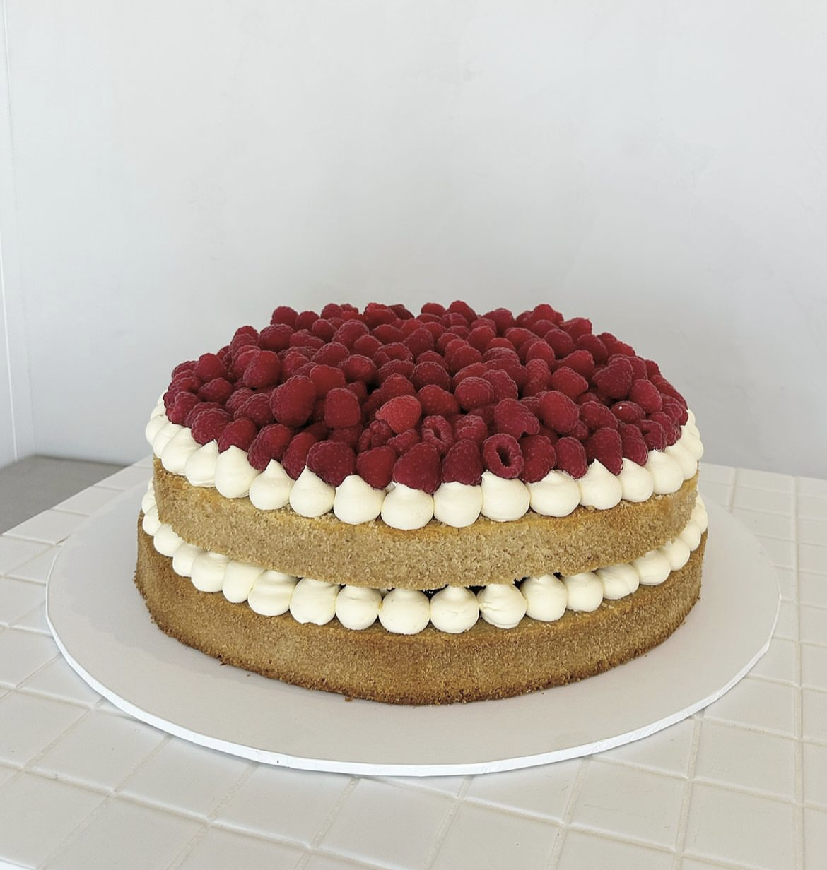 Naked Raspberry Round Cake