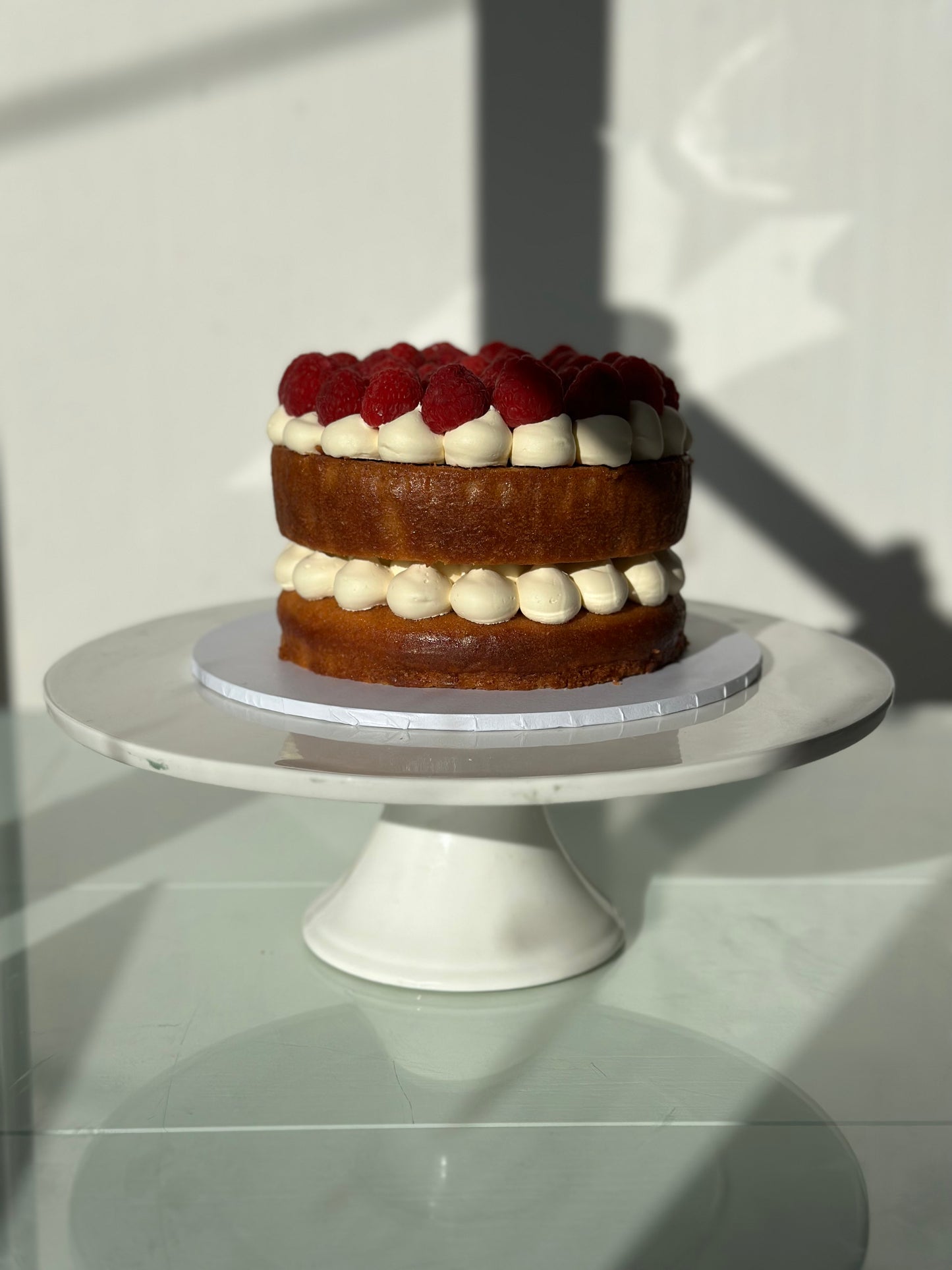 Naked Raspberry Round Cake