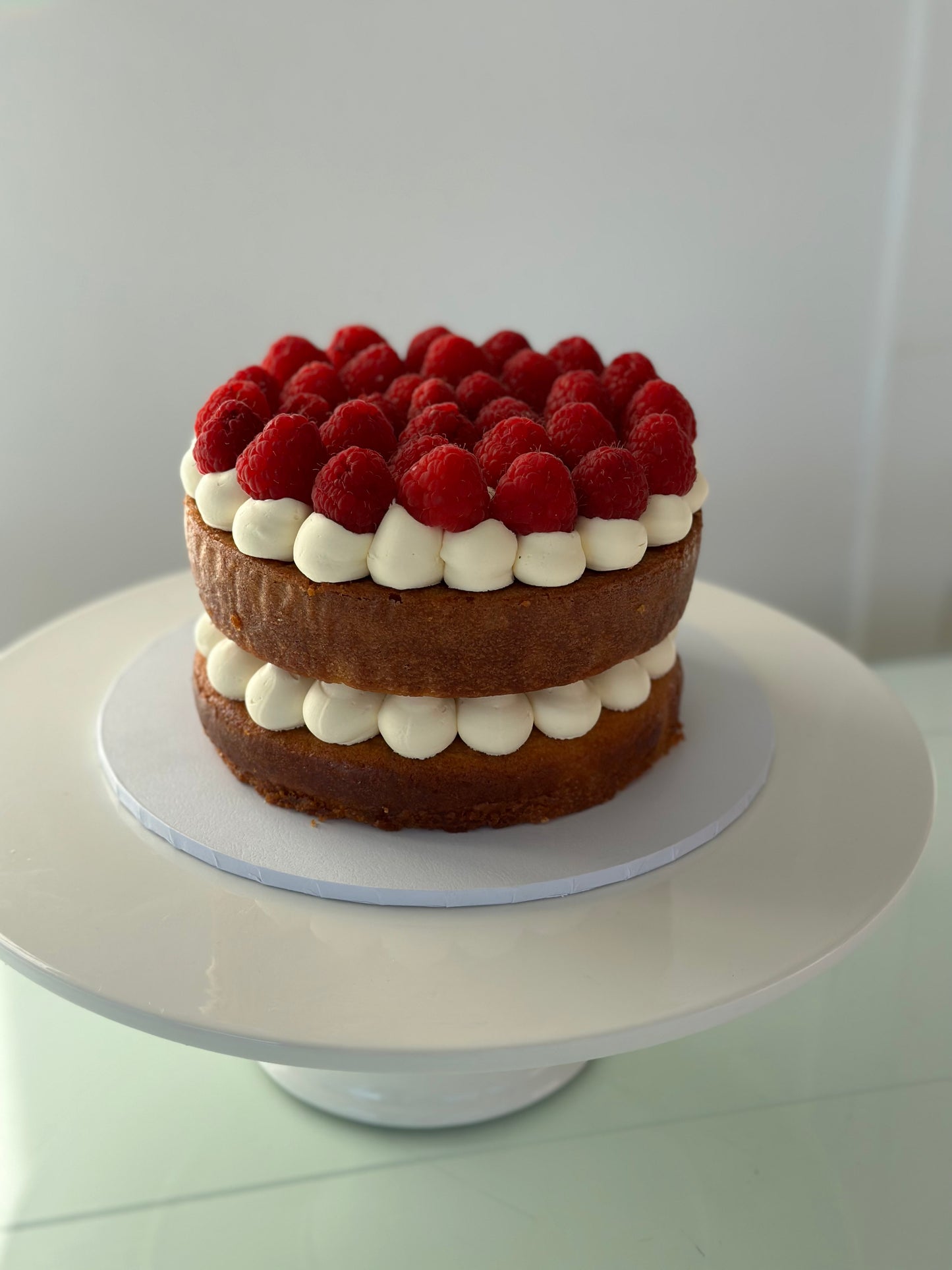 Naked Raspberry Round Cake